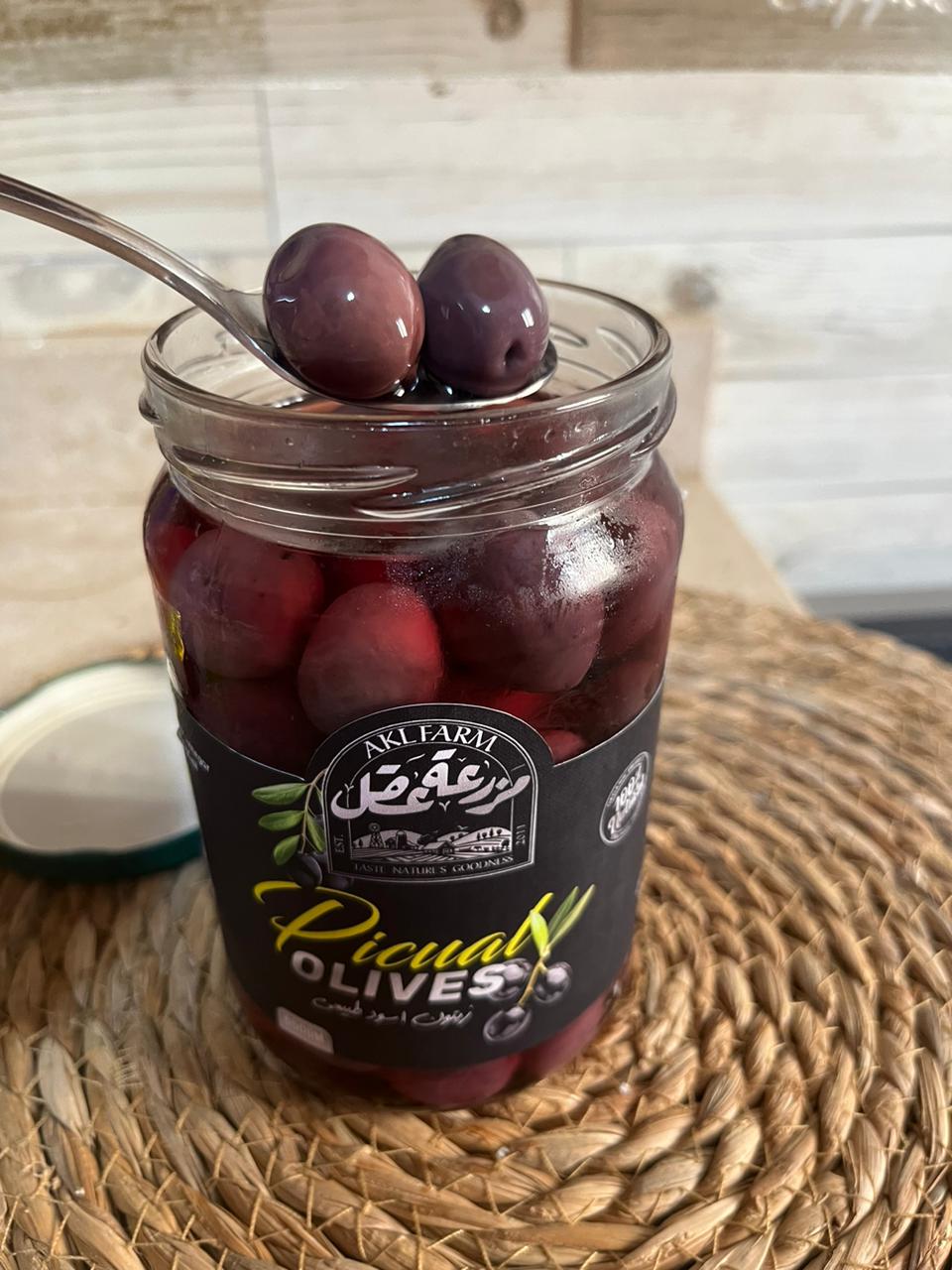 Natural black pickled picol olives 650 gm